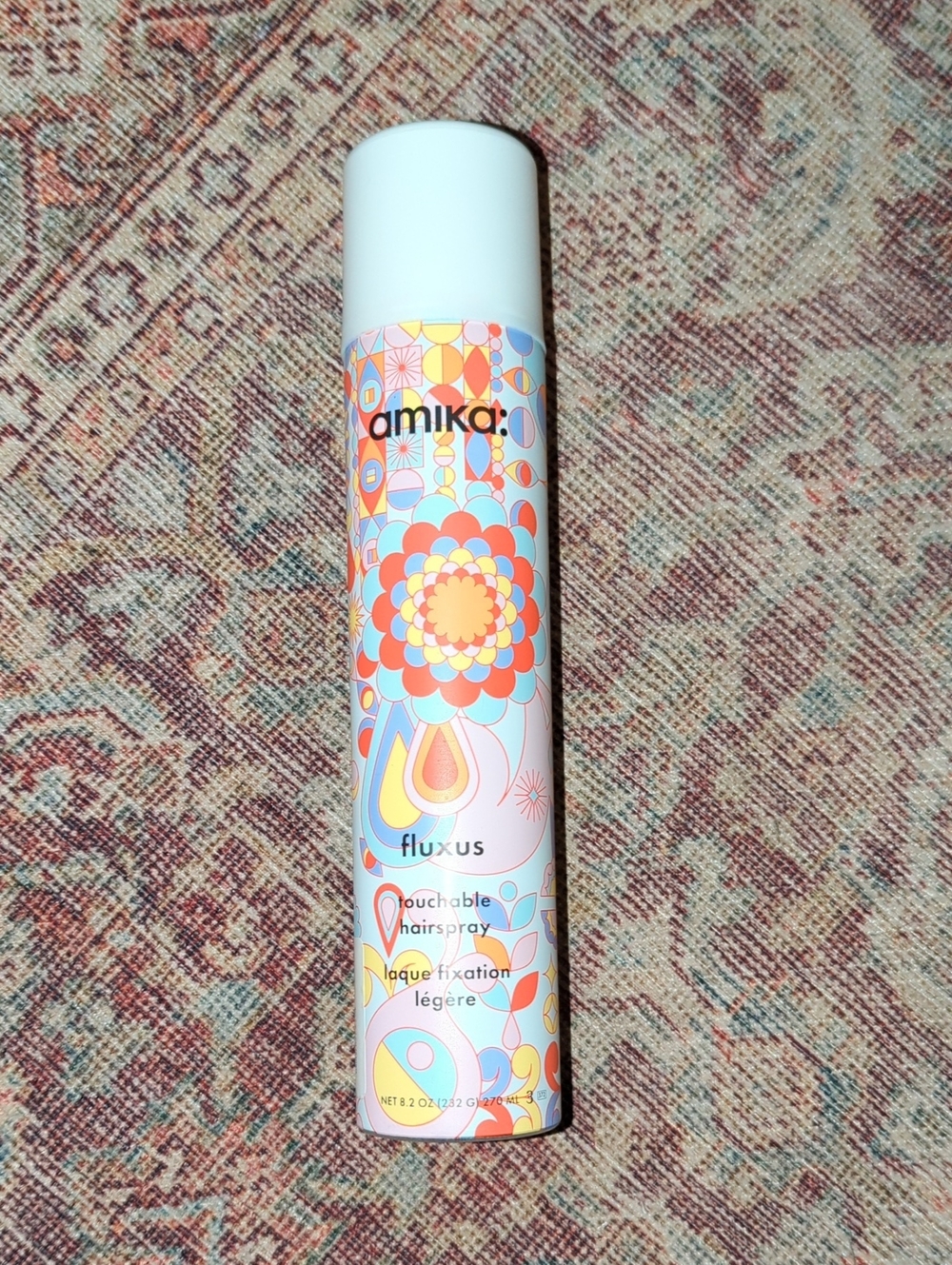 amika Fluxus Touchable Hairspray .